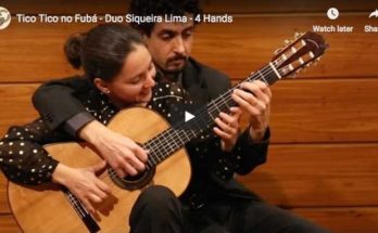 The Siqueira Lima Duo is playing Tico-Tico no Fubá at four hands on a guitar